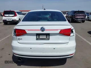 2017 Volkswagen Jetta GLI z VIN 3VW5T7AJ3HM257978, wystawiony jako IAAI lot #41855055 z przebiegiem 177 344 mil mil oraz . Historia ofert i sprzedaży dostępna na DreamBid. Obrazek 17.