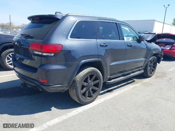 2015 Jeep Grand Cherokee Altitude with VIN 1C4RJFAG8FC954649, listed as a IAAI auction lot 41906591 with 76,804 mi miles. Bid and sale history available at carsss.com. Image 4.