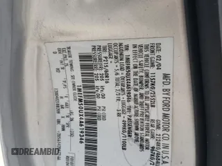 2004 Mercury Sable GS z VIN 1MEFM50UX4A619346, wystawiony jako Copart lot #71295284 z przebiegiem 71 883 mil mil oraz Szkoda całkowita • Salvage title. Historia ofert i sprzedaży dostępna na DreamBid. Obrazek 14.