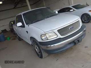 2001 Ford F-150 XLT with VIN 1FTRW07LX1KD77186, listed as a IAAI auction lot 42564774 with 190,647 mi miles and . Bid and sale history available at DreamBid. Image 1.