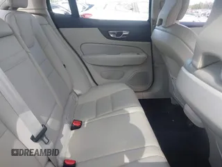 2022 Volvo S60 Momentum z VIN 7JRL12FZ1NG162991, wystawiony jako IAAI lot #42364000 z przebiegiem 69 626 mil mil oraz . Historia ofert i sprzedaży dostępna na DreamBid. Obrazek 8.