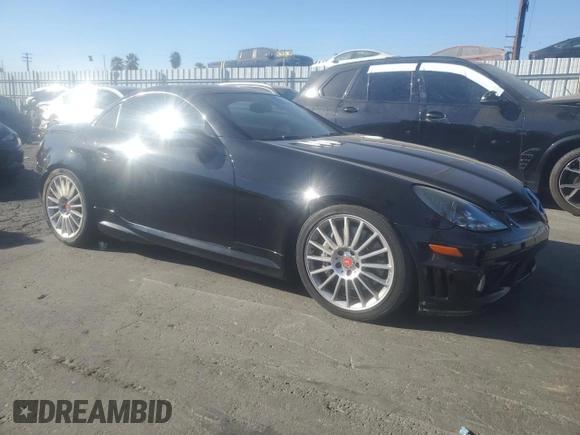 2006 Mercedes-Benz SLK-Class 5.5L AMG with VIN WDBWK73F16F093516, listed as a Copart auction lot 77485754 with 112,419 mi miles and Salvage Title. Bid and sale history available at carsss.com. Image 4.