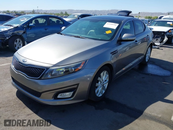 2014 Kia Optima EX z VIN 5XXGN4A72EG339786, wystawiony jako IAAI lot #42328516 z przebiegiem 103 035 mil mil oraz . Historia ofert i sprzedaży dostępna na DreamBid. Obrazek 2.