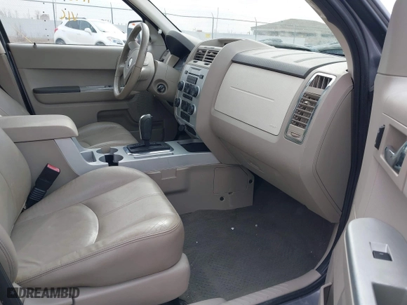 2008 Mercury Mariner with VIN 4M2CU91118KJ13477, listed as a IAAI auction lot 41987552 with 130,238 mi miles. Bid and sale history available at carsss.com. Image 5.