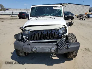 2015 Jeep Wrangler Unlimited Sport RHD with VIN 1C4BJWKG0FL690763, listed as a Copart auction lot 48823714 with 156,714 mi miles and Salvage title. Bid and sale history available at DreamBid. Image 5.