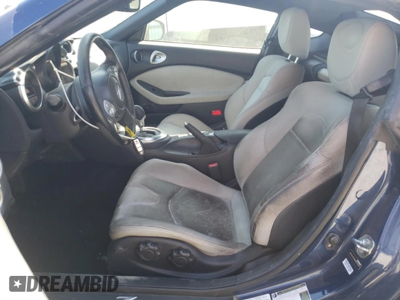2014 Nissan 370Z Touring with VIN JN1AZ4EH6EM633394, listed as a Copart auction lot 74360354 with 0 mi miles and Salvage Title. Bid and sale history available at carsss.com. Image 7.
