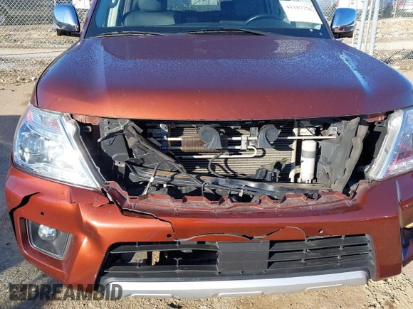 2018 Nissan Armada SL with VIN JN8AY2ND4J9059526, listed as a IAAI auction lot 41187756 with 116,572 mi miles and . Bid and sale history available at DreamBid. Image 6.
