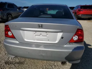 2005 Honda Civic LX with VIN 1HGEM21565L035293, listed as a Copart auction lot 74350794 with 197,536 mi miles and Salvage Title. Bid and sale history available at DreamBid. Image 6.