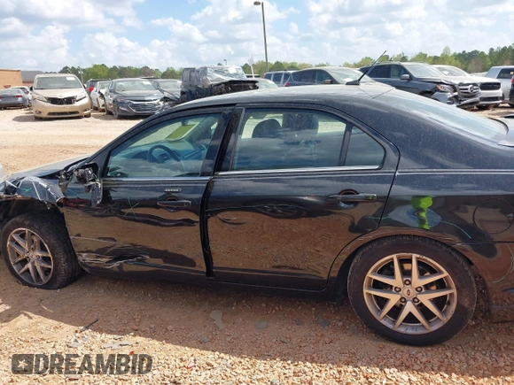 2012 Ford Fusion SEL with VIN 3FAHP0JA7CR308816, listed as a IAAI auction lot 41953714 with 170,232 mi miles and . Bid and sale history available at carsss.com. Image 14.