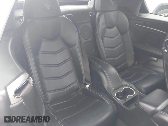 2013 Maserati GranTurismo Convertible Sport with VIN ZAM45VMA9D0070293, listed as a IAAI auction lot 41241020 with 69,156 mi miles. Bid and sale history available at carsss.com. Image 8.