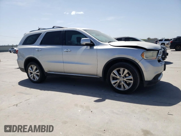 2013 Dodge Durango Crew with VIN 1C4SDHDTXDC552531, listed as a Copart auction lot 50353595 with 181,386 mi miles and Salvage title. Bid and sale history available at DreamBid. Image 4.