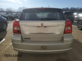 2009 Dodge Caliber SXT z VIN 1B3HB48A59D104136, wystawiony jako Copart lot #45971285 z przebiegiem 291 374 mil mil oraz Szkody całkowita. Historia ofert i sprzedaży dostępna na DreamBid. Obrazek 6.
