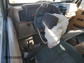 2000 Jeep Wrangler Sahara with VIN 1J4FA59SXYP764539, listed as a Copart auction lot 52707385 with 136,159 mi miles and Salvage title. Bid and sale history available at DreamBid. Image 8.