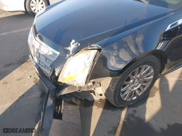 2011 Cadillac CTS Sedan with VIN 1G6DA5EY0B0135351, listed as a IAAI auction lot 41433130 with 111,120 mi miles. Bid and sale history available at carsss.com. Image 6.