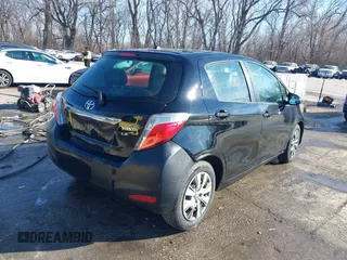 2012 Toyota Yaris L with VIN JTDKTUD31CD500337, listed as a IAAI auction lot 41410723 with 130,881 mi miles. Bid and sale history available at carsss.com. Image 4.