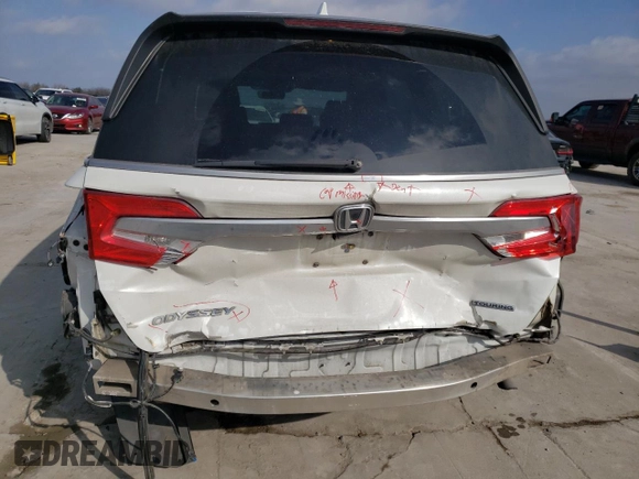 2020 Honda Odyssey Touring z VIN 5FNRL6H8XLB008222, wystawiony jako Copart lot #48782205 z przebiegiem 152 088 mil mil oraz Szkoda całkowita • Salvage title. Historia ofert i sprzedaży dostępna na DreamBid. Obrazek 6.