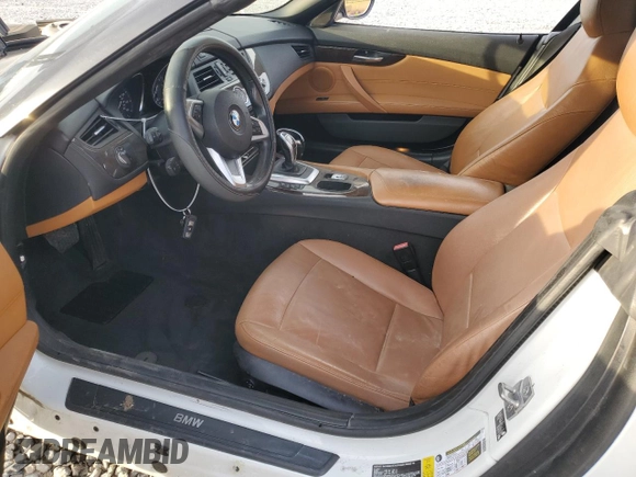 2012 BMW Z4 sDrive28i with VIN WBALL5C59CJ103051, listed as a Copart auction lot 87015834 with 92,071 mi miles and Salvage title. Bid and sale history available at DreamBid. Image 7.