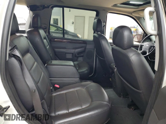 2004 Ford Explorer Limited z VIN 1FMDU75K34ZB18288, wystawiony jako Copart lot #58470475 z przebiegiem 200 787 mil mil oraz Szkoda całkowita • Salvage title. Historia ofert i sprzedaży dostępna na DreamBid. Obrazek 11.