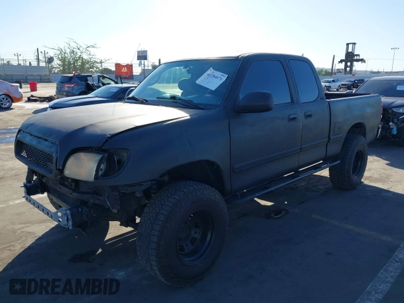 2000 Toyota Tundra SR5 with VIN 5TBRT3419YS114034, listed as a IAAI auction lot 41284071 with 200,797 mi miles and . Bid and sale history available at DreamBid. Image 2.