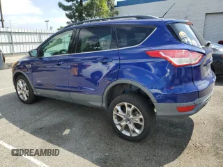 2015 Ford Escape SE with VIN 1FMCU0GX0FUC12849, listed as a Copart auction lot 54771305 with 90,287 mi miles and Salvage Title. Bid and sale history available at carsss.com. Image 2.