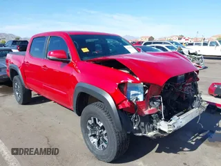 2016 Toyota Tacoma SR with VIN 3TMCZ5AN2GM005637, listed as a IAAI auction lot 42236844 with 102,144 mi miles and . Bid and sale history available at DreamBid. Image 1.