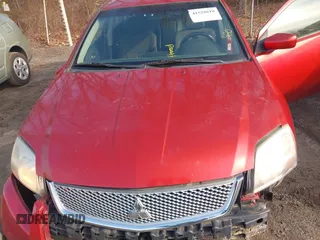 2012 Mitsubishi Galant FE with VIN 4A32B2FF2CE024735, listed as a IAAI auction lot 41528618 with 217,173 mi miles. Bid and sale history available at carsss.com. Image 10.