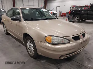 2003 Pontiac Grand Am SE1 with VIN 1G2NF52EX3C104710, listed as a IAAI auction lot 42053621 with 102,012 mi miles. Bid and sale history available at carsss.com. Image 1.