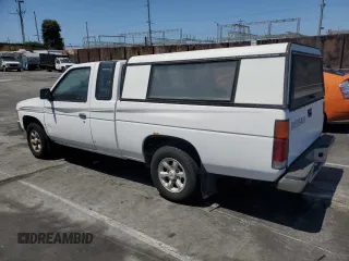 1997 Nissan Frontier XE with VIN 1N6SD16S3VC427137, listed as a Copart auction lot 57911575 with 228,542 mi miles and Clean title. Bid and sale history available at DreamBid. Image 2.