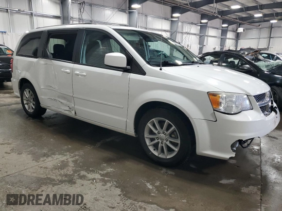 2014 Dodge Grand Caravan SXT with VIN 2C4RDGCG6ER427435, listed as a Copart auction lot 51957355 with 106,078 mi miles and Salvage Title. Bid and sale history available at DreamBid. Image 4.