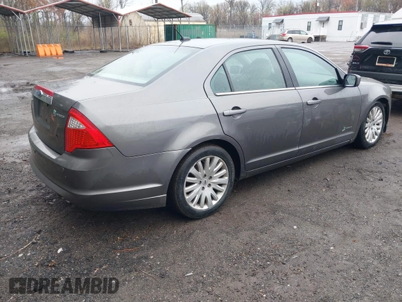 2012 Ford Fusion Hybrid with VIN 3FADP0L34CR215667, listed as a IAAI auction lot 41957936 with 158,914 mi miles and . Bid and sale history available at DreamBid. Image 4.