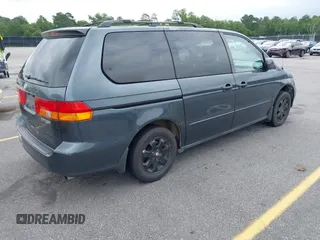 2003 Honda Odyssey EX-L with VIN 5FNRL18963B059910, listed as a IAAI auction lot 42415037 with 267,600 mi miles and . Bid and sale history available at DreamBid. Image 4.