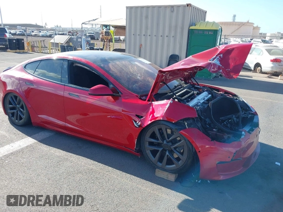 2022 Tesla Model S Plaid with VIN 5YJSA1E61NF460253, listed as a IAAI auction lot 40328727 with Not provided miles and . Bid and sale history available at DreamBid. Image 1.