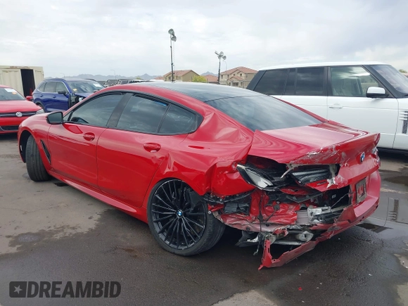 2022 BMW 8 Series M850i z VIN WBAGV8C04NCH90015, wystawiony jako IAAI lot #42020711 z przebiegiem 39 801 mil mil oraz . Historia ofert i sprzedaży dostępna na DreamBid. Obrazek 3.