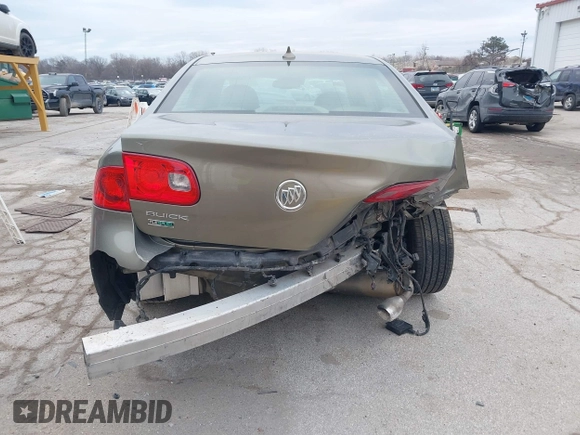 2011 Buick Lucerne CXL Premium with VIN 1G4HJ5EM0BU104715, listed as a IAAI auction lot 41706751 with 123,636 mi miles. Bid and sale history available at carsss.com. Image 16.