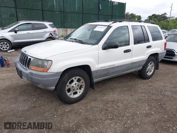 2000 Jeep Grand Cherokee Laredo z VIN 1J4GW48S2YC390226, wystawiony jako IAAI lot #42326715 z przebiegiem 273 806 mil mil oraz . Historia ofert i sprzedaży dostępna na DreamBid. Obrazek 2.