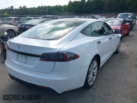 2021 Tesla Model S Long Range with VIN 5YJSA1E57MF428512, listed as a IAAI auction lot 42511020 with 29,611 mi miles and . Bid and sale history available at DreamBid. Image 4.