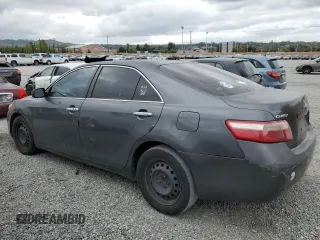 2007 Toyota Camry CE with VIN 4T1BE46K57U556135, listed as a Copart auction lot 54595615 with 248,096 mi miles and Salvage Title. Bid and sale history available at carsss.com. Image 2.