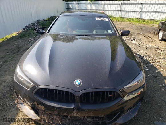 2023 BMW 8 Series M850i with VIN WBAGV8C09PCK80498, listed as a Copart auction lot 59668124 with 44,527 mi miles and Salvage Title. Bid and sale history available at carsss.com. Image 5.