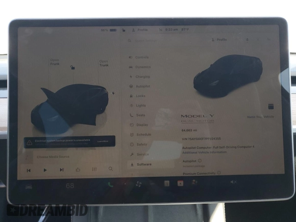 2023 Tesla Model Y Performance with VIN 7SAYGDEF7PF924355, listed as a Copart auction lot 47877055 with 64,663 mi miles and Salvage Title. Bid and sale history available at DreamBid. Image 9.