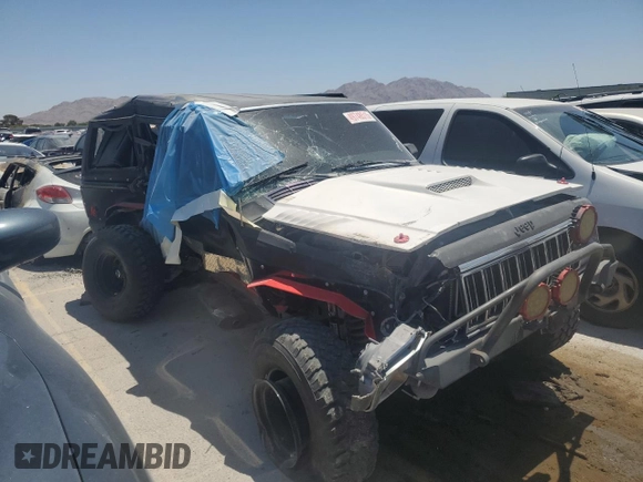 1991 Jeep Cherokee с VIN 1J4FJ58S6ML588768, выставлен на аукционе Copart как лот 49748515 с пробегом 193 621 миль миль и На запчасти • Non repairable. История ставок и продаж доступна на DreamBid. Изображение 4.