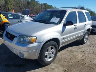 2005 Ford Escape Hybrid with VIN 1FMCU95H45KD16867, listed as a IAAI auction lot 41661311 with 206,698 mi miles. Bid and sale history available at carsss.com. Image 17.