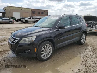 2011 Volkswagen Tiguan SEL z VIN WVGBV7AX7BW524711, wystawiony jako Copart lot #53572135 z przebiegiem 124 883 mil mil oraz Szkoda całkowita • Salvage title. Historia ofert i sprzedaży dostępna na DreamBid. Obrazek 1.