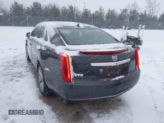 2013 Cadillac XTS with VIN 2G61N5S37D9112979, listed as a IAAI auction lot 41209826 with 83,237 mi miles. Bid and sale history available at carsss.com. Image 3.