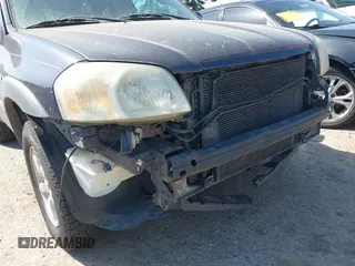 2006 Mazda Tribute i with VIN 4F2YZ02Z16KM00215, listed as a IAAI auction lot 42153919 with 272,828 mi miles and . Bid and sale history available at carsss.com. Image 6.
