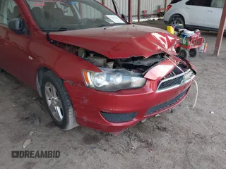 2008 Mitsubishi Lancer DE z VIN JA3AU26U28U042624, wystawiony jako IAAI lot #42257243 z przebiegiem 144 862 mil mil oraz . Historia ofert i sprzedaży dostępna na DreamBid. Obrazek 6.