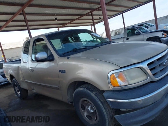 2000 Ford F-150 XL with VIN 1FTZX1723YKB48613, listed as a IAAI auction lot 41611851 with 187,450 mi miles. Bid and sale history available at carsss.com. Image 13.