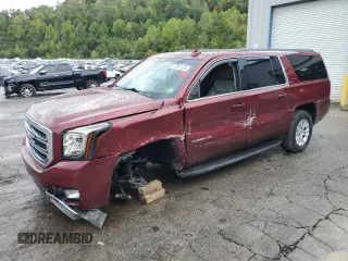 2019 GMC Yukon XL SLT Standard Edition with VIN 1GKS2JKC0KR128371, listed as a Copart auction lot 72687234 with 75,570 mi miles and Salvage Title. Bid and sale history available at carsss.com. Image 1.