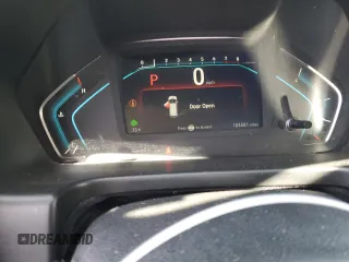 2018 Honda Odyssey Touring with VIN 5FNRL6H8XJB018438, listed as a Copart auction lot 61876505 with 104,581 mi miles and Salvage title. Bid and sale history available at DreamBid. Image 9.
