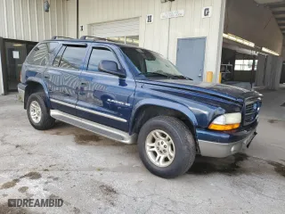2001 Dodge Durango with VIN 1B4HS28Z71F592326, listed as a Copart auction lot 65591464 with 125,080 mi miles and Salvage Title. Bid and sale history available at carsss.com. Image 4.