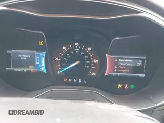 2013 Ford Fusion Titanium Hybrid with VIN 3FA6P0RU5DR339716, listed as a IAAI auction lot 41405835 with 197,840 mi miles. Bid and sale history available at carsss.com. Image 7.